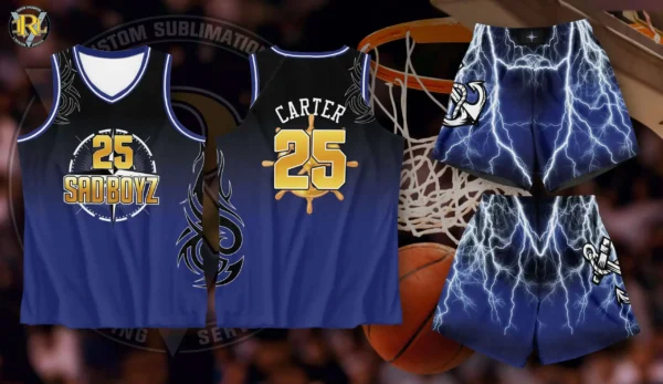 A black and blue gradient basketball jersey featuring "SADBOYZ" and the number "25" on the front, and "CARTER" above the number "25" on the back. The set includes matching shorts with a lightning bolt design. A basketball hoop and ball are in the background, suggesting a basketball context.